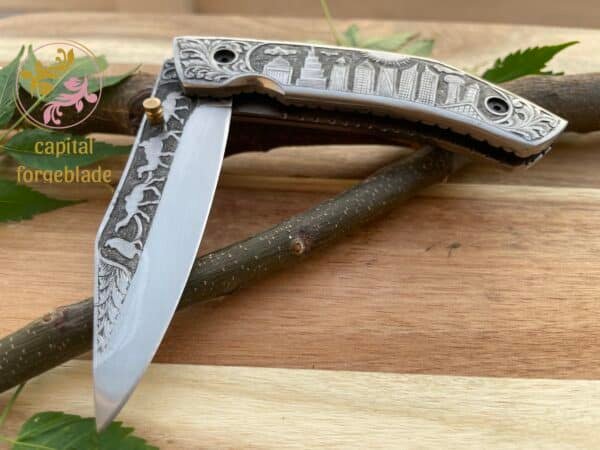 Hand Engraved d2 steel folding knife